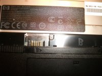 Lower battery bay screw.JPG Lower battery bay screw.JPG